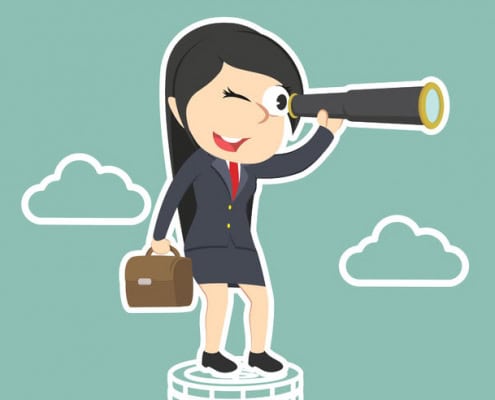 Businesswoman looking through monocular on cliff