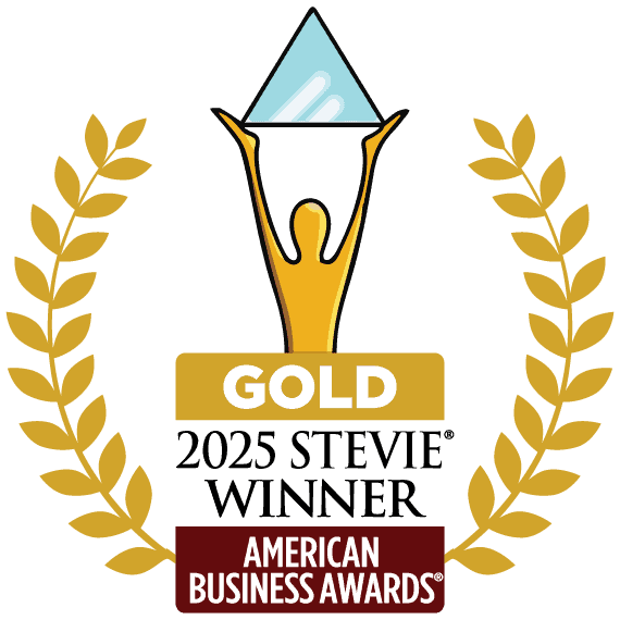 Gold trophy logo with a triangle top, laurel wreath, and text: "GOLD" and "American Business Awards®"—symbol of a top honor.